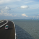A bus crosses the Hong Kong-Zhuhai-Macau bridge in Zhuhai, Guangdong province, last year. The full bridge is not open yet.